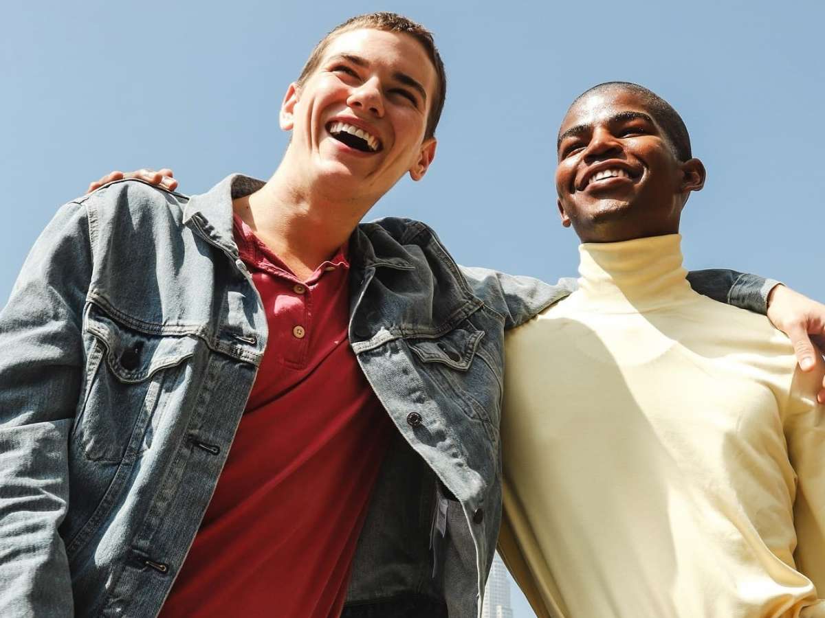 teen boys hugging